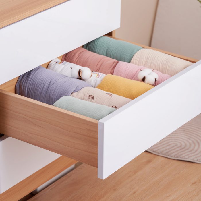 Crib covers in various colors in the drawer